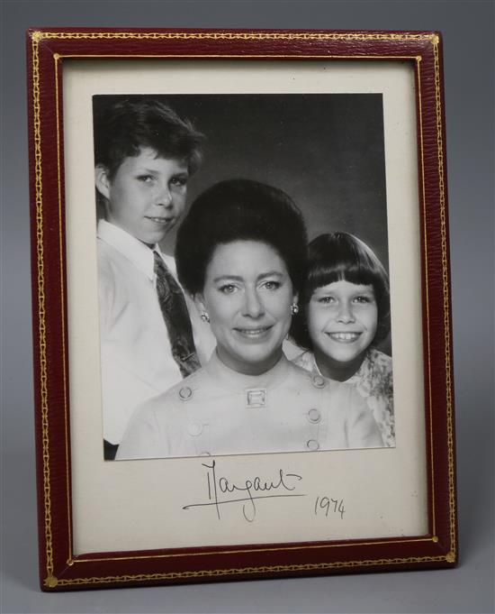 A presentation portrait photograph of Princess Margaret, David Armstrong-Jones and Lady Sarah Chatto